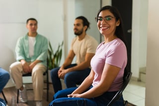 Support group therapy meeting, diverse people receiving mental health support