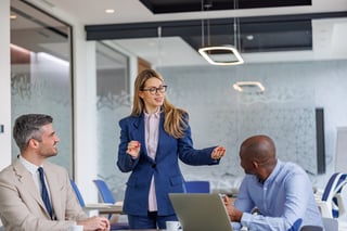 Professional businesswoman leading corporate meeting presenting strategy with colleagues
